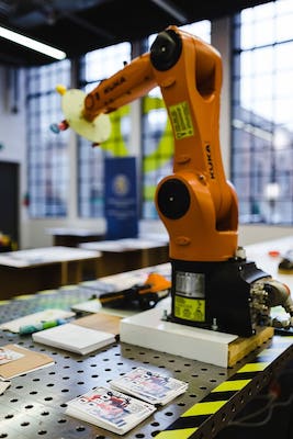 add industrial robots to a robotics lab